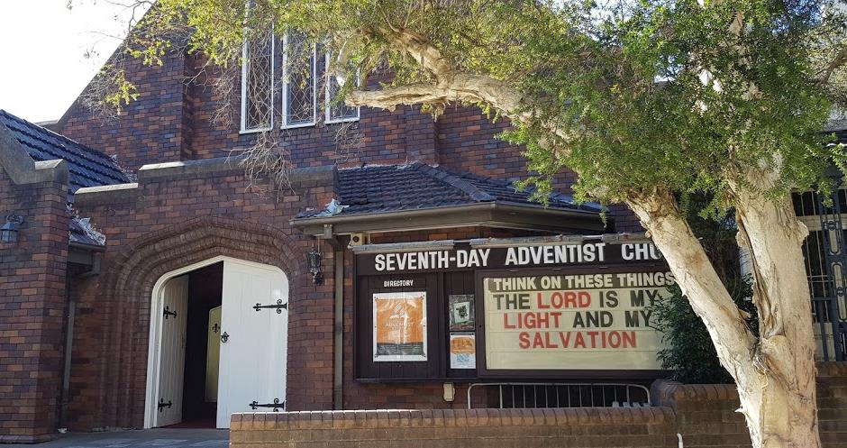Members sharing a meal together after service